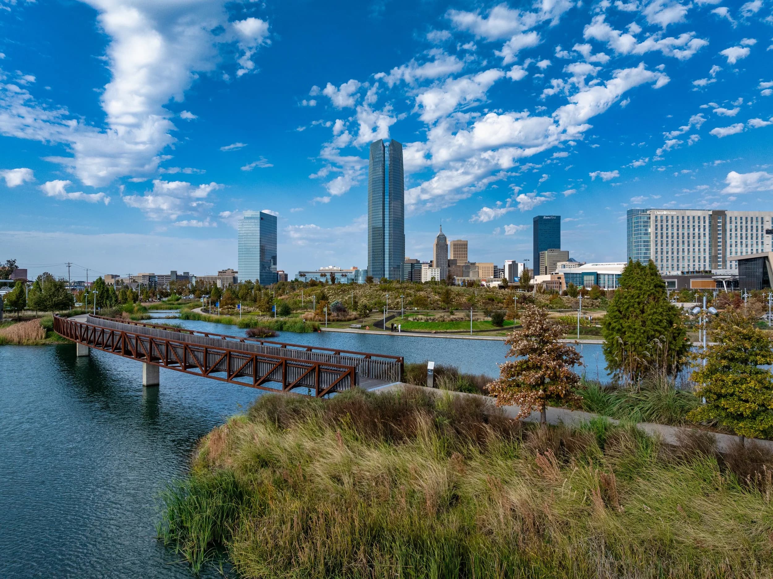 Scissortail Park, downtown OKC skyline beyond the water.